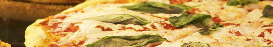Eating Italian Pizza at Federal Hill Pizza - Warren restaurant in Warren, RI.